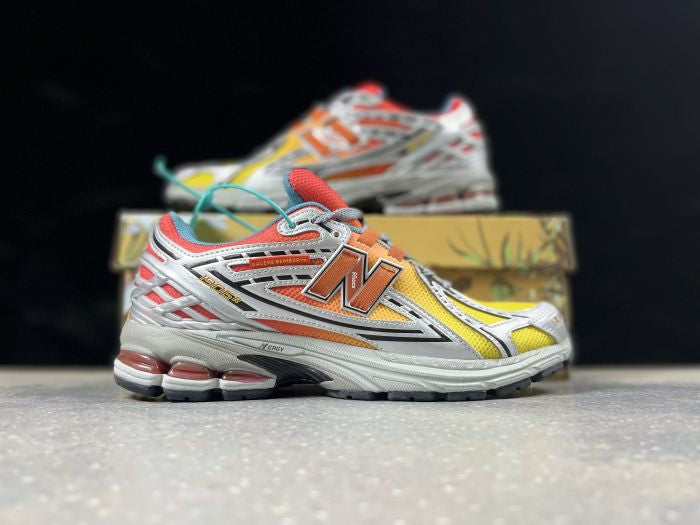 NEW BALANCE NB 1906 R JAUNE ORANGE