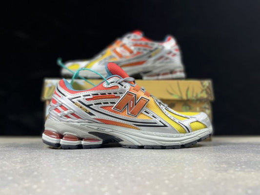 NEW BALANCE NB 1906 R JAUNE ORANGE