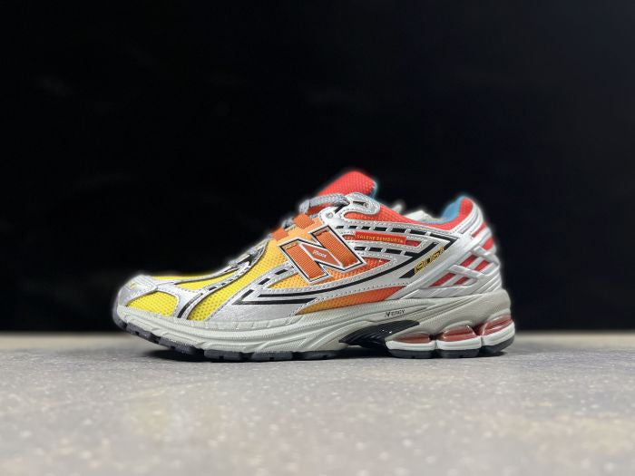 NEW BALANCE NB 1906 R JAUNE ORANGE